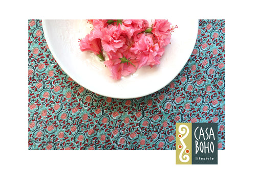 Decorative placemat with floral design and Casa Boho logo